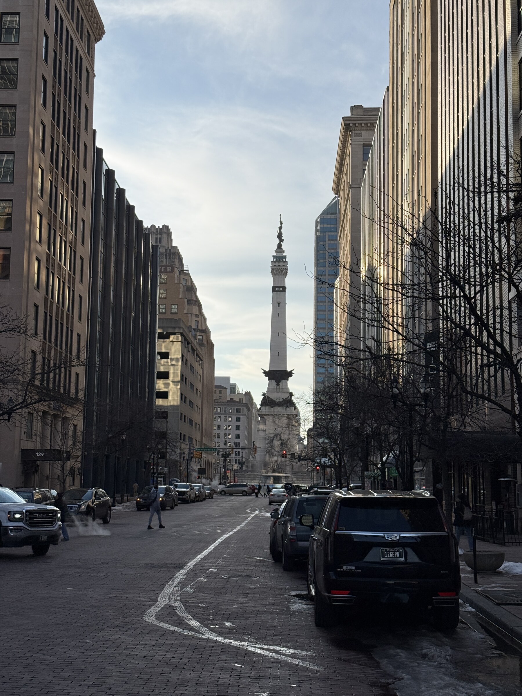View down a brick street toward Soldiers and Sailors Monument